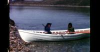 Children fishing from small boat